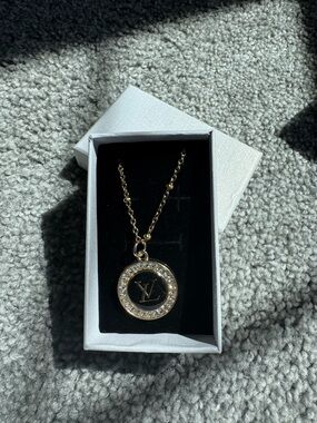 Louis Vuitton Gold and Black Crystal Circle Pendant Necklace